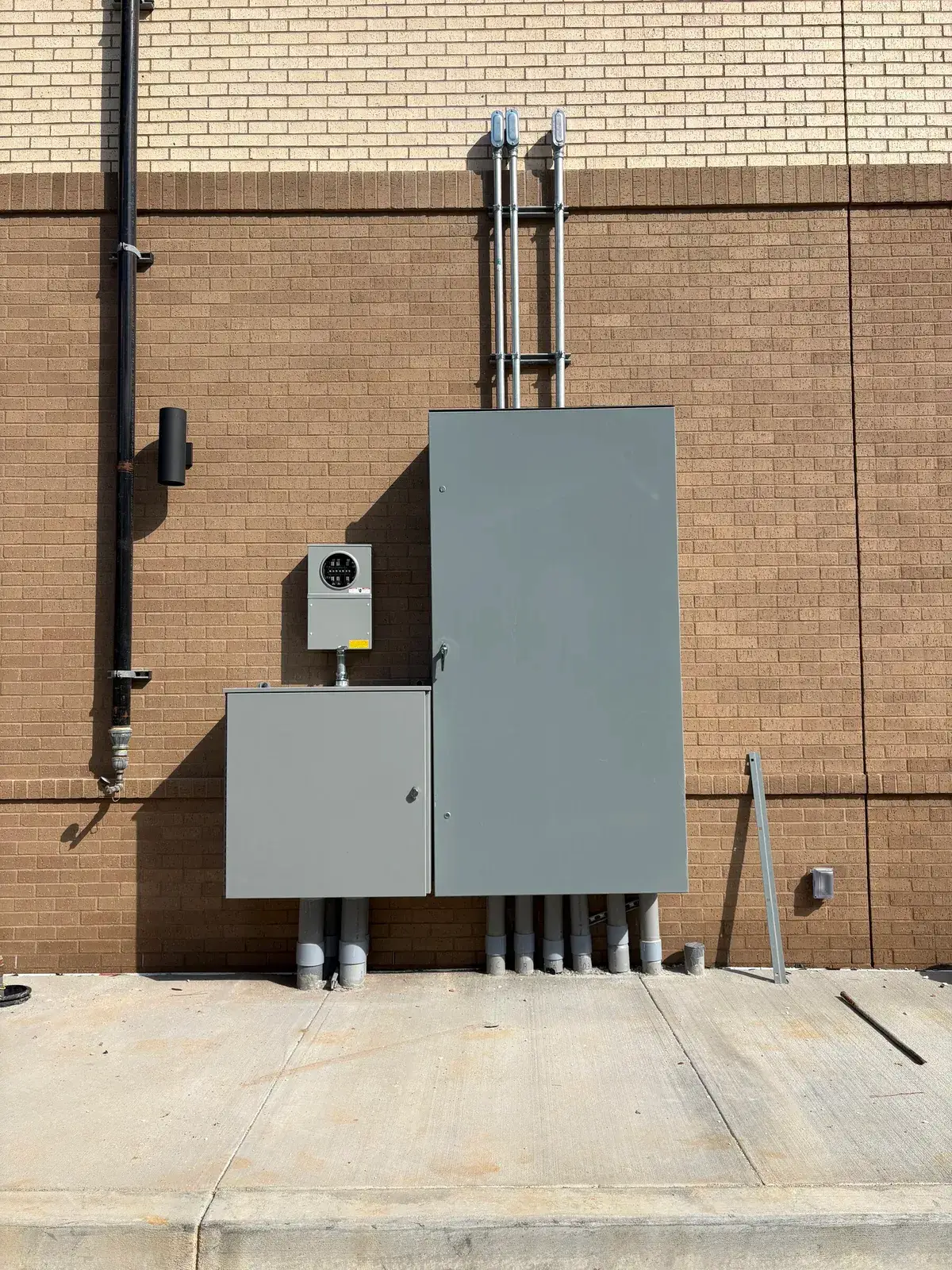 Exterior electrical service cabinets on a Fairhope commercial build